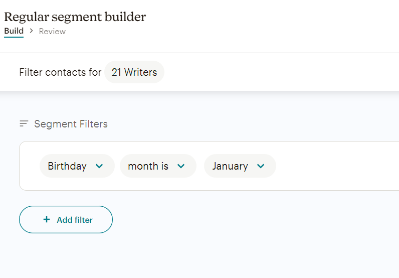 Mailchimp's Regular segment builder allows you to filter contacts with multiple segment filters, one of them being a specific birthday month.